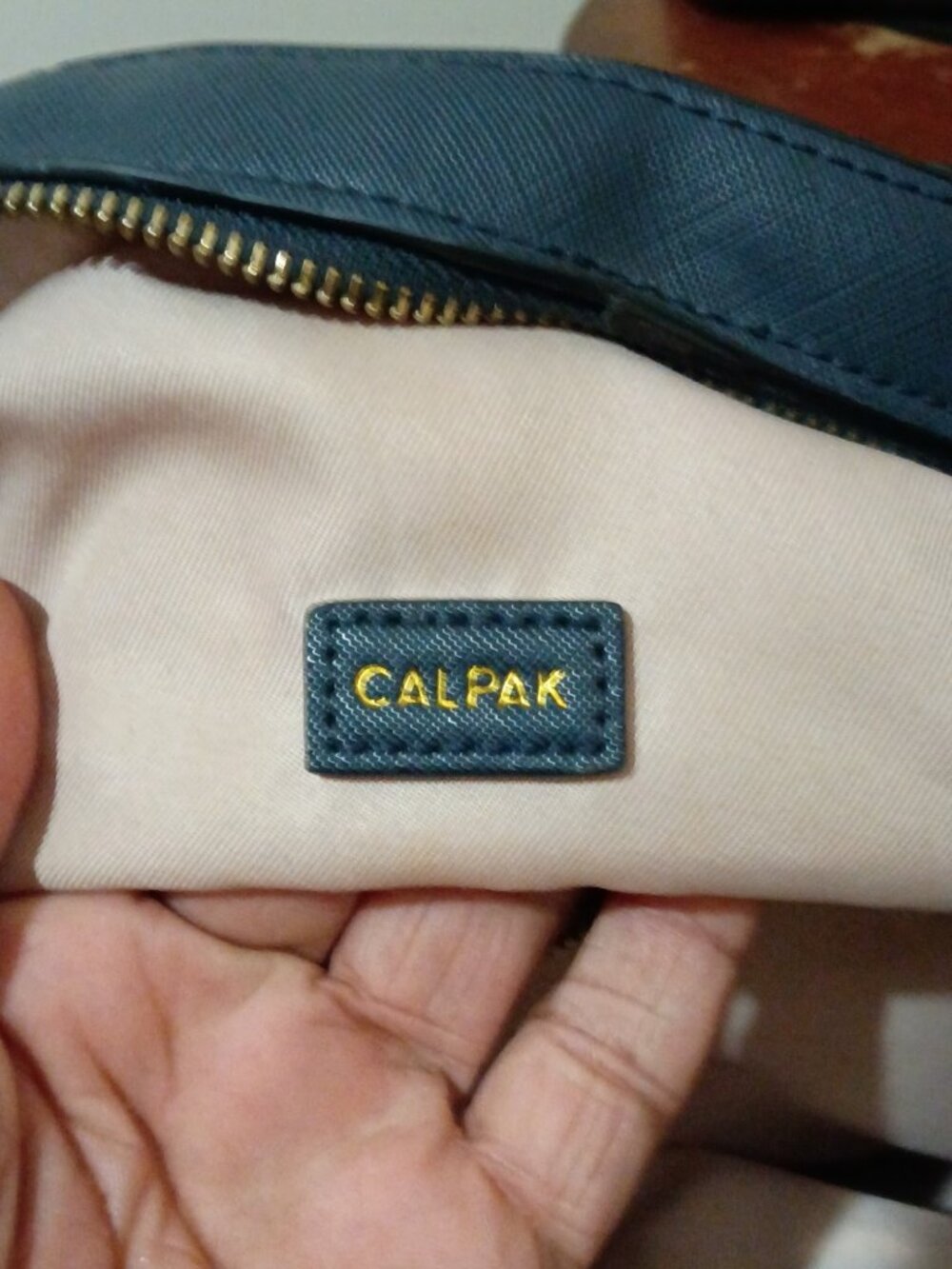 Calpak Kaya Backpack Blue Faux Leather Gold Hardware Trolly Sleeve Side Pockets - Picture 5 of 11